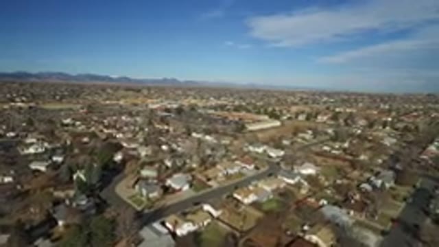 WESTMINSTER COLORADO-2016: A Beautiful Blue Sky With White Clouds Over Suburban Homes