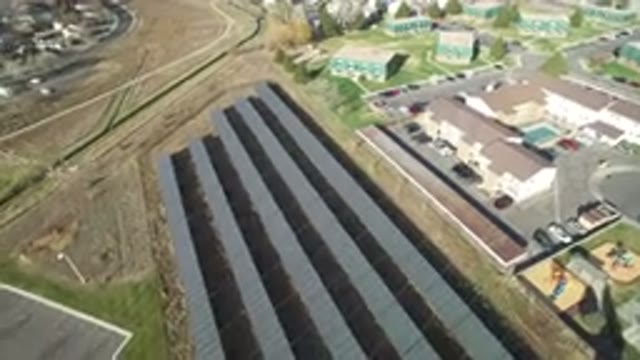 WESTMINSTER COLORADO-2016: Large Solar Panel Farm With Slow Panning Camera