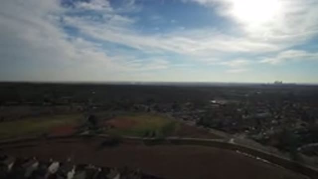 WESTMINSTER COLORADO-2016: Drone Video Of A Bright Sun Overlooking A Large City