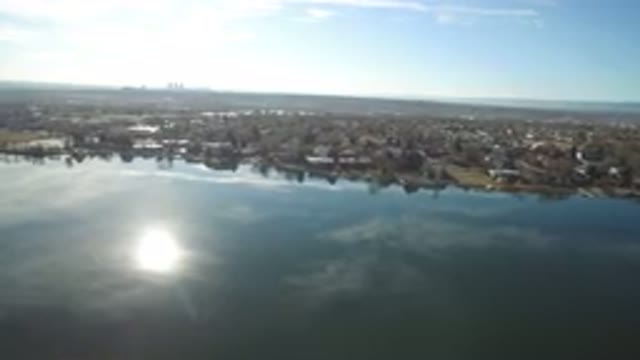 WESTMINSTER COLORADO-2016: Aerial Footage Of A Town Along The Edge Of A Water
