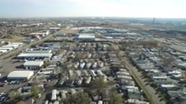 WESTMINSTER COLORADO-2016: Camera Zooming In And Out Over A City With Lots Of Buildings