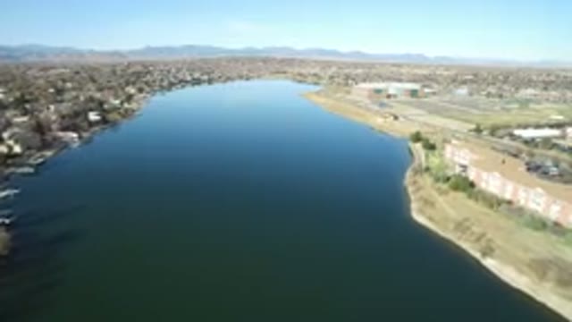 WESTMINSTER COLORADO-2016: Calming Blue Ocean Water With Beach Houses All Around