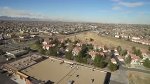 HIDDEN LAKE COLORADO-2016: High Altitude View of Houses, Streets, and Cars Flying Above