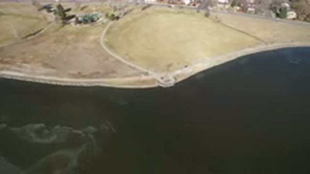HIDDEN LAKE COLORADO-2016: Drone Video Of Lake With A Path Which Has Golf Carts