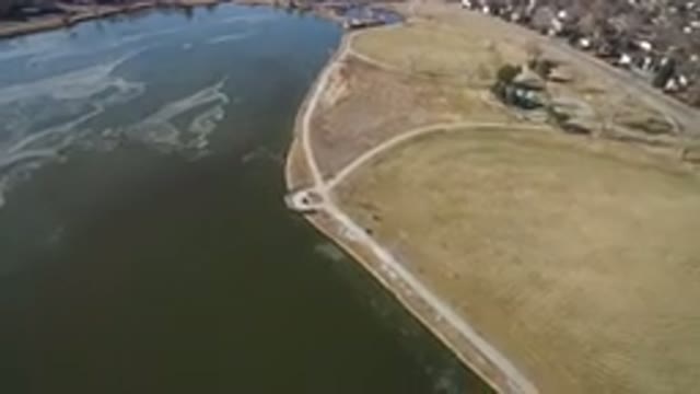 HIDDEN LAKE COLORADO-2016: Drone Footage Over Lake Town On Shore Roads Buildings