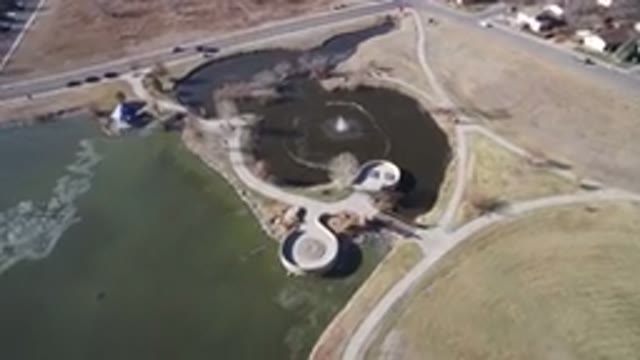HIDDEN LAKE COLORADO-2016: Traffic Commute Vehicles Heading Over Road Top View
