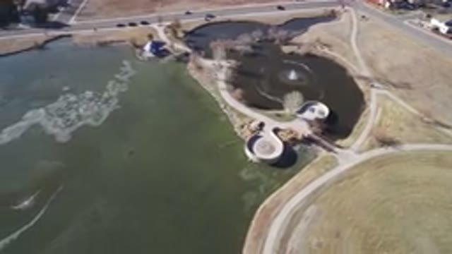 HIDDEN LAKE COLORADO-2016: Drone Video Of A Small Park Next To A Large Clear Lake