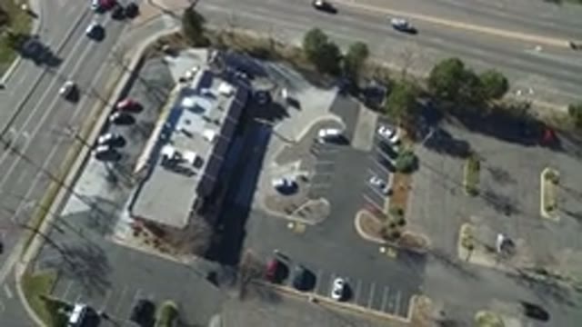 HIDDEN LAKE COLORADO-2016: Cars Moving In A Parking Lot And In Traffic