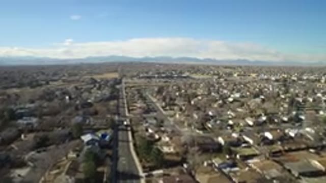HIDDEN LAKE COLORADO-2016: Aerial View Of Houses With Brown Grass And Trees With