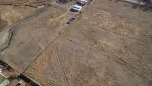 HIDDEN LAKE COLORADO-2016: Bird's Eye View Of Brown Fields With Farm Buildings