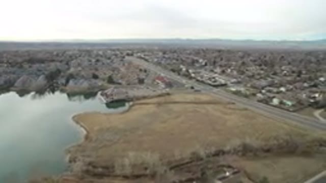 WESTMINSTER COLORADO-2016: Drone Footage Over Town Lake Roads Trees Buildings