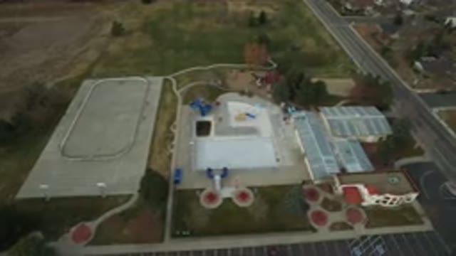 WESTMINSTER COLORADO-2016: Air Footage Of A Factory Like Building Next To A Road