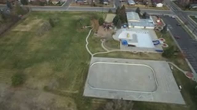 WESTMINSTER COLORADO-2016: Drone View Of A Field With Houses Surrounding
