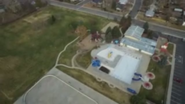 WESTMINSTER COLORADO-2016: Drone Flies Over Buildings Parking Lot Cars Homes