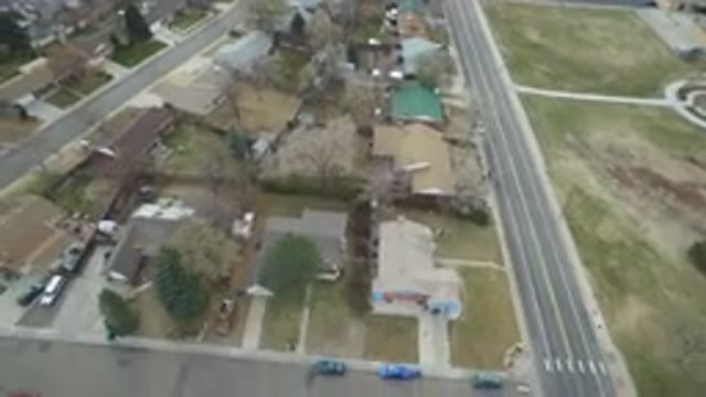 WESTMINSTER COLORADO-2016: A Small Housing Area With Bare Trees And Cars All