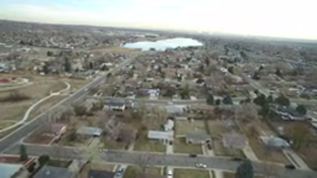 WESTMINSTER COLORADO-2016: Airplane View Of A Gray Sky At A Small Town In The