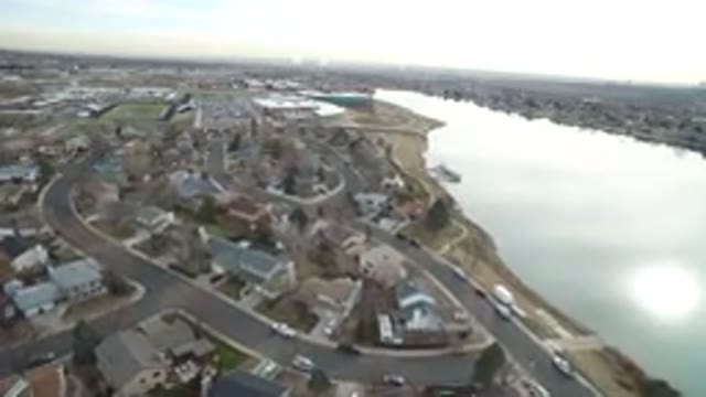 WESTMINSTER COLORADO-2016: A River Is Flowing Through A Neighborhood Full Of Homes And Trees