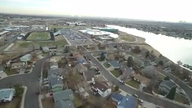 WESTMINSTER COLORADO-2016: An Aerial View Of Homes Next To A Lake And Near A