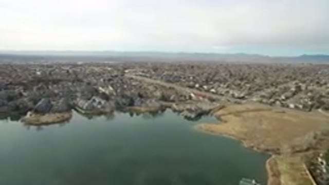 WESTMINSTER COLORADO-2016: Drone's Eye View Of Lake And Distant Buildings
