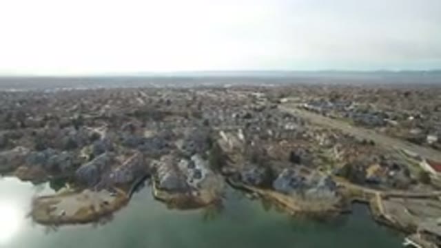 WESTMINSTER COLORADO-2016: City With A Big Greenish Lake And Busy Main Road