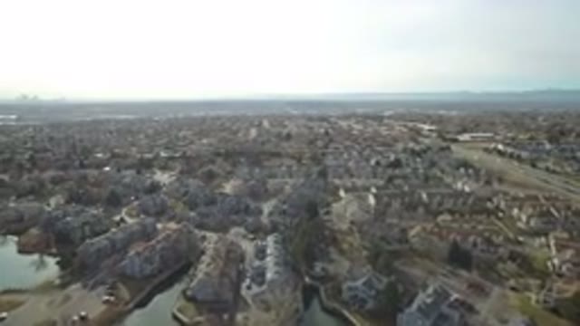 WESTMINSTER COLORADO-2016: Aerial View Of A City Including Streets Water