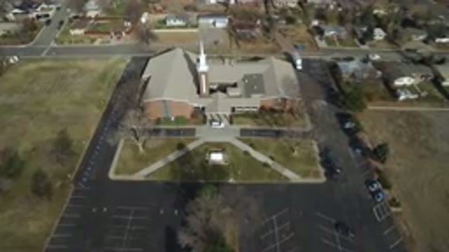 WESTMINSTER COLORADO-2016: Large Building With Parking Lot And Grass Fields
