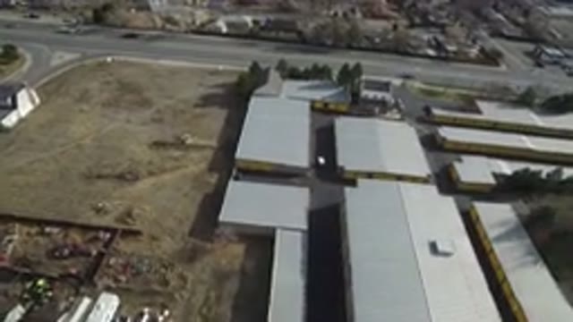 WESTMINSTER COLORADO-2016: Aerial Footage Of Large Buildings Next To A Big Highway