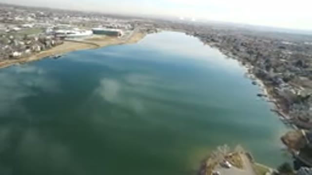 WESTMINSTER COLORADO-2016: Flyover Of A River Flowing Between Buildings And Homes