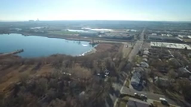 HIDDEN LAKE COLORADO-2016: Drone Footage Of Lake During A Sunny Day With Trees And Houses