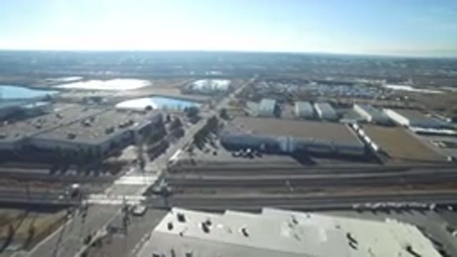 HIDDEN LAKE COLORADO-2016: Soaring Over An Urban Landscape Crossing Roads And