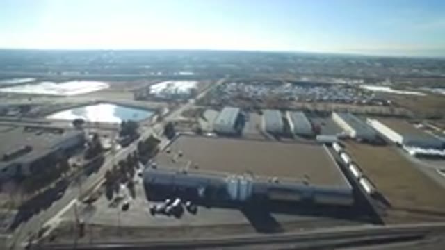 HIDDEN LAKE COLORADO-2016: Drone Video Of Large Buildings Next To A Blue Lake