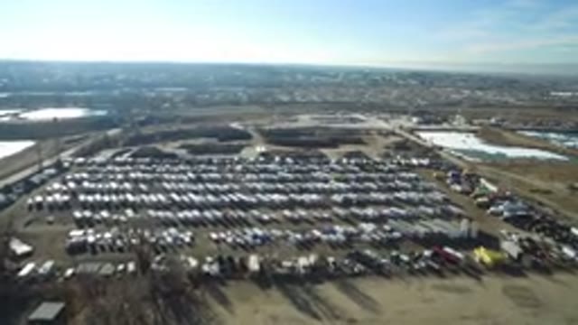 HIDDEN LAKE COLORADO-2016: City Skyline View Of Car Dealership