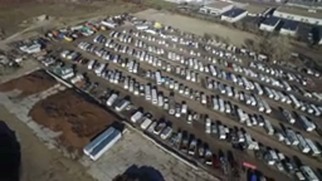 HIDDEN LAKE COLORADO-2016: A Yard Of Full Trailers With Worker's Buildings