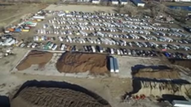 HIDDEN LAKE COLORADO-2016: Sky View Of Trailer Yard Next To Construction Area