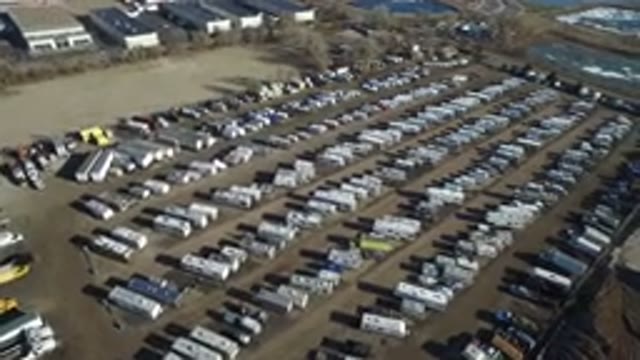 HIDDEN LAKE COLORADO-2016: Bird's Eye View Of A Car Park With Lots Of Cards And