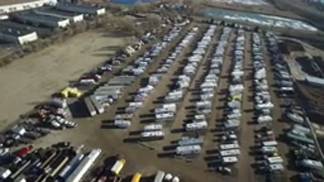 HIDDEN LAKE COLORADO-2016: Factories Parking Vehicles Truck Cars