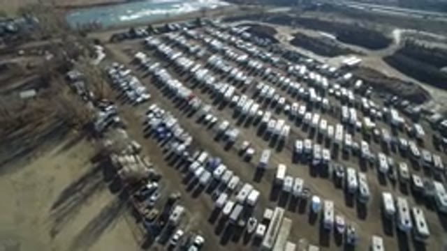 HIDDEN LAKE COLORADO-2016: Lot Of Cars And Trucks In A Big Parking Lot