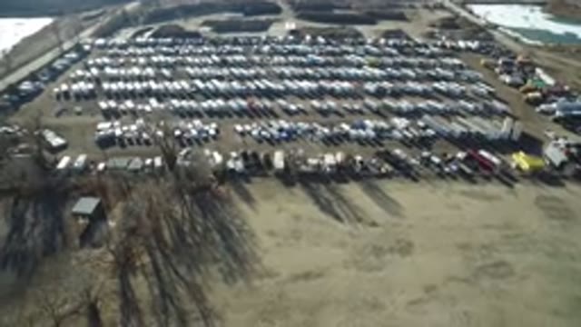 HIDDEN LAKE COLORADO-2016: Wide View Of A Field Of Vehicles Sitting On A Plain