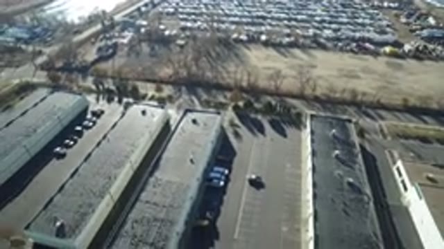 HIDDEN LAKE COLORADO-2016: Aerial Shot From Drone Panning Over An Industrial