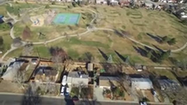HIDDEN LAKE COLORADO-2016: A Drone With A Rotating Camera Observing A Tennis Court