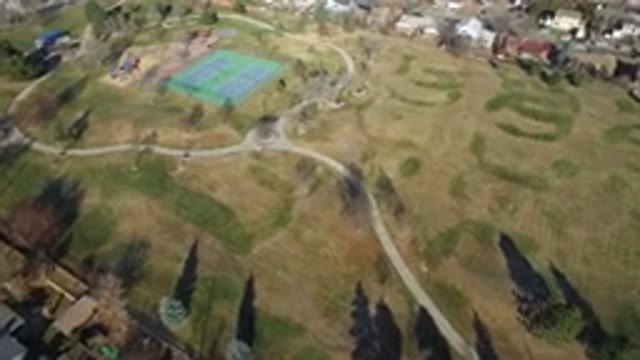 HIDDEN LAKE COLORADO-2016: Overhead View Of A Park With A Tennis Court And
