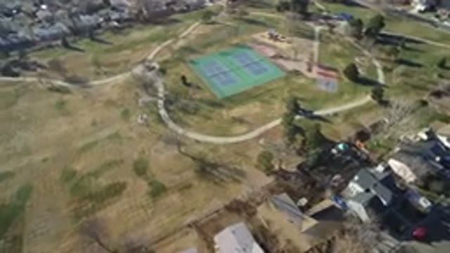 HIDDEN LAKE COLORADO-2016: Drone View Of A Field With A Tennis Stadium In The