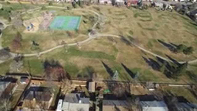 HIDDEN LAKE COLORADO-2016: Drone Video Of A Park With A Tennis Court And A Playground