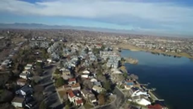 HIDDEN LAKE COLORADO-2016: Camera Pans Over Sunny Suburban Area With Lake And