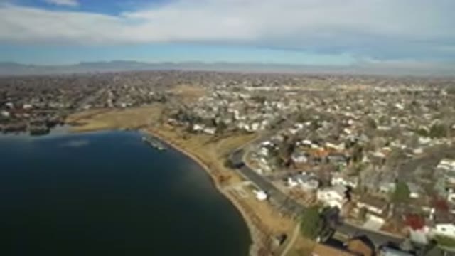 HIDDEN LAKE COLORADO-2016: A Body of Water, Large Homes, Busy Streets, No Cars Are