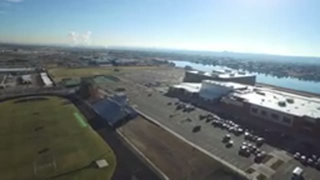 HIDDEN LAKE COLORADO-2016: A View Over A River Left Side With Industrial Buildings