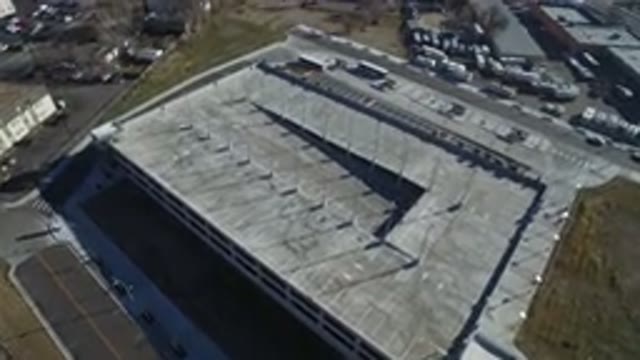 HIDDEN LAKE COLORADO-2016: Large Concrete Parking Garage Near Industrial Buildings