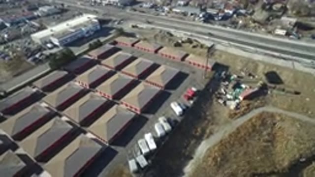 HIDDEN LAKE COLORADO-2016: Rotating Drone Footage Over Storage Facility And Suburban Buildings