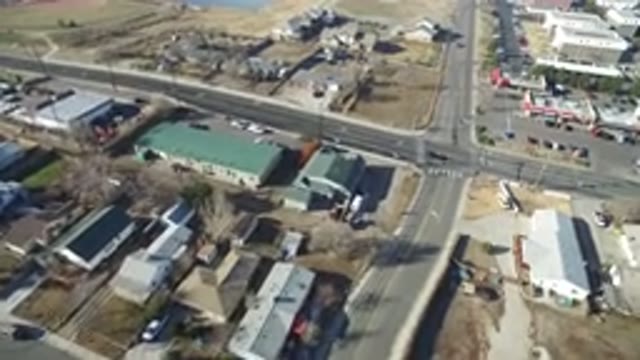 HIDDEN LAKE COLORADO-2016: Bird's Eye View Of Cars Driving Through Intersection
