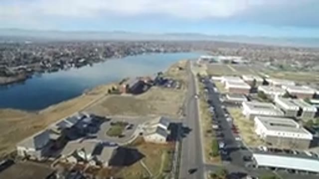 HIDDEN LAKE COLORADO-2016: Overhead Shot Of A Small Lake And Nearby Industrial
